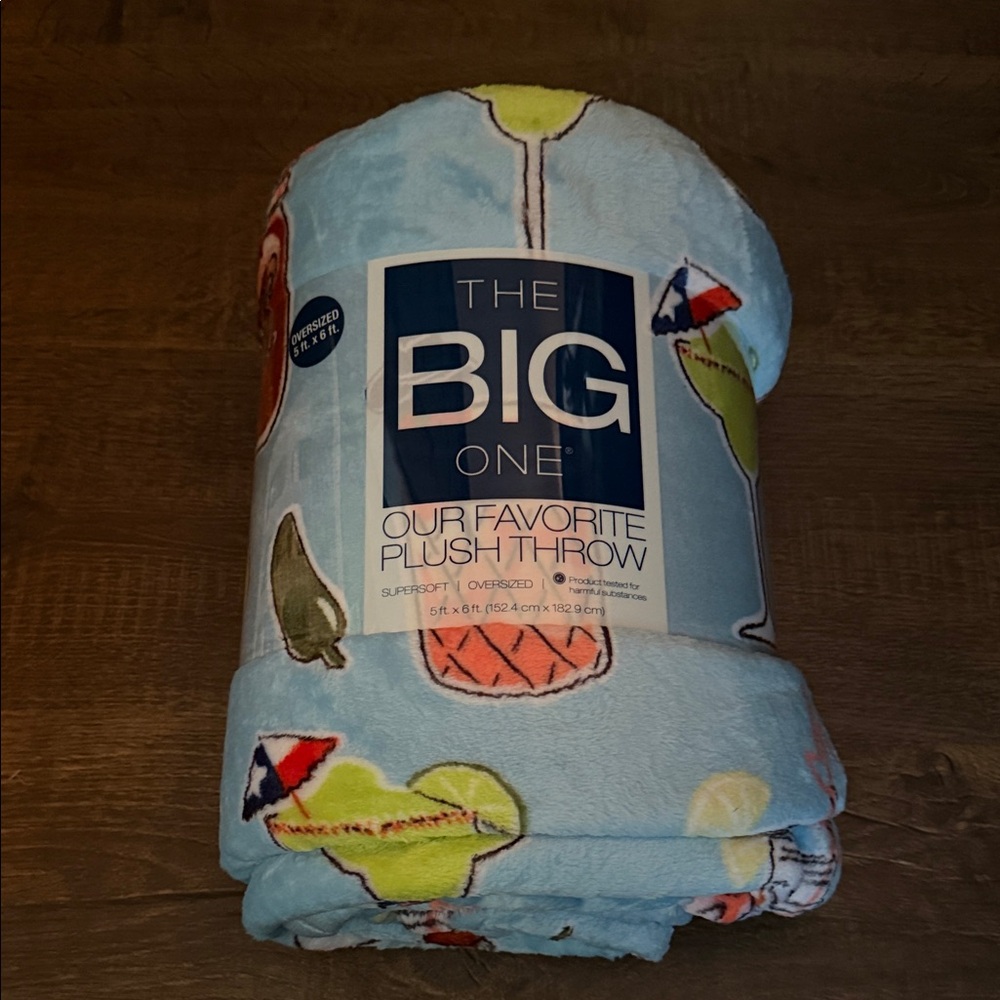 The Big One Plush Throw in Light Blue with Colorful Pattern